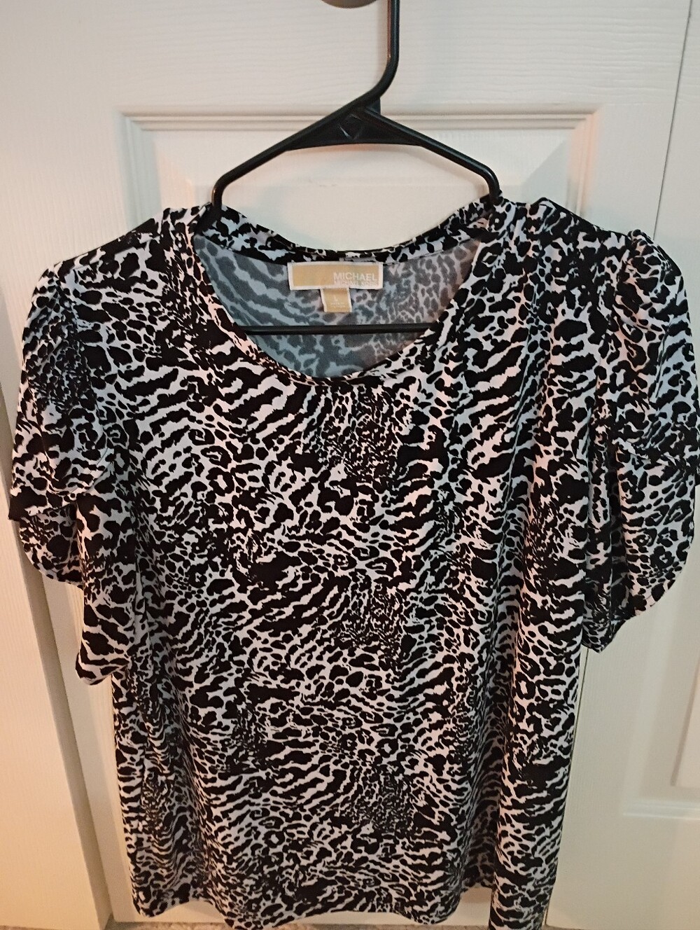 MICHAEL Michael Kors Black and White Animal Print Short Sleeve Blouse.